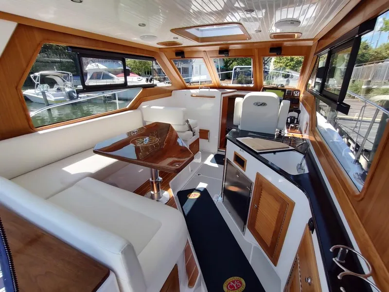 Slide: The Image of Luxurious interior of 2023 True North 34 OE yacht with elegant wood finishes. - 10