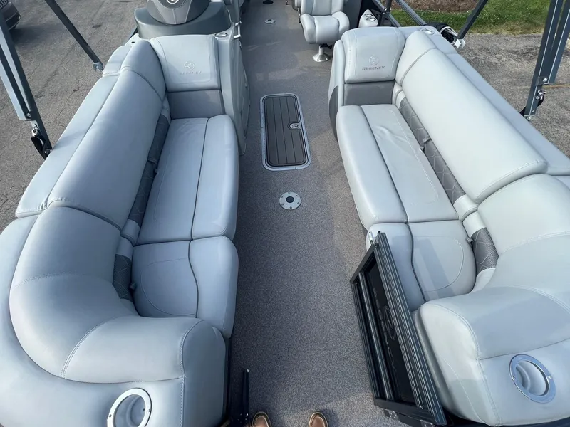 Slide: The Image of 2021 Regency 230 LE3 boat interior with gray leather seating. - 6