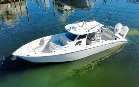 Slide: The Image of 2023 Solace 41 CS boat on calm water. - 13