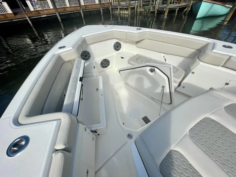 Slide: The Image of 2023 Solace 41 CS boat interior with seating and storage compartments. - 18