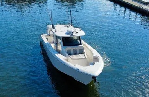 Slide: The Image of 2023 Solace 41 CS boat cruising on calm waters. - 9