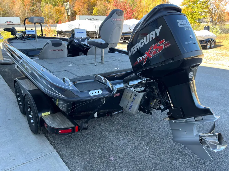 Slide: The Image of 2018 Phoenix 21 boat with Mercury Pro XS engine on trailer. - 14
