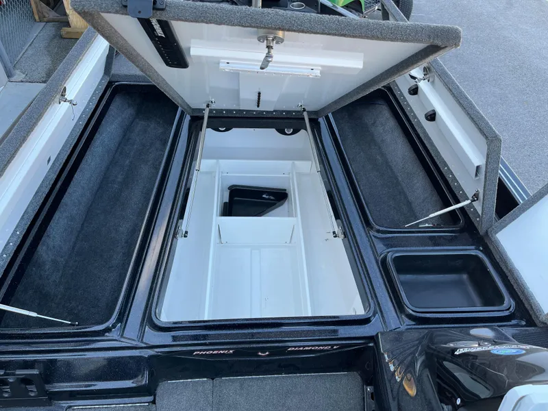Slide: The Image of 2018 Phoenix 21 boat storage compartments open, showcasing ample space and organization. - 5