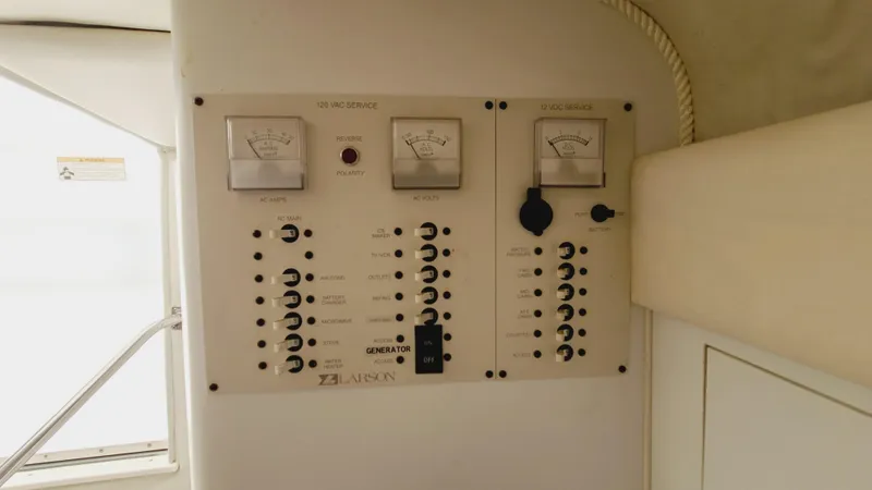 Slide: The Image of Control panel of a 1994 Larson 300 Cabrio boat. - 26