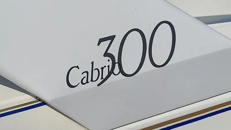 Slide: The Image of 1994 Larson 300 Cabrio boat model nameplate - 32