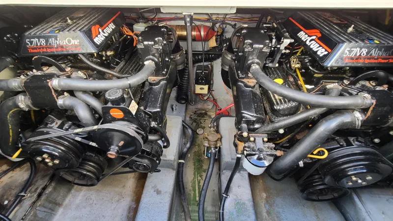 Slide: The Image of Twin MerCruiser 5.7L V8 engines in a 1994 Larson 300 Cabrio boat. - 28