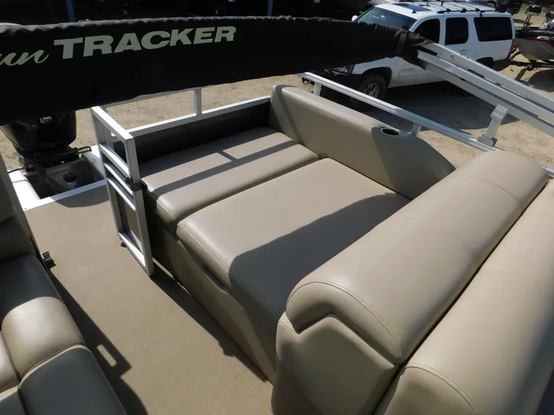 Slide: The Image of 2023 Sun Tracker Party Barge 22 RF DLX with beige seating and spacious layout. - 17