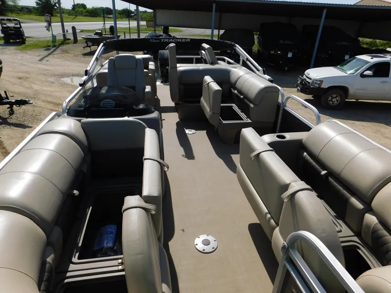 Slide: The Image of 2023 Sun Tracker Party Barge 22 RF DLX pontoon boat with spacious seating and storage. - 21