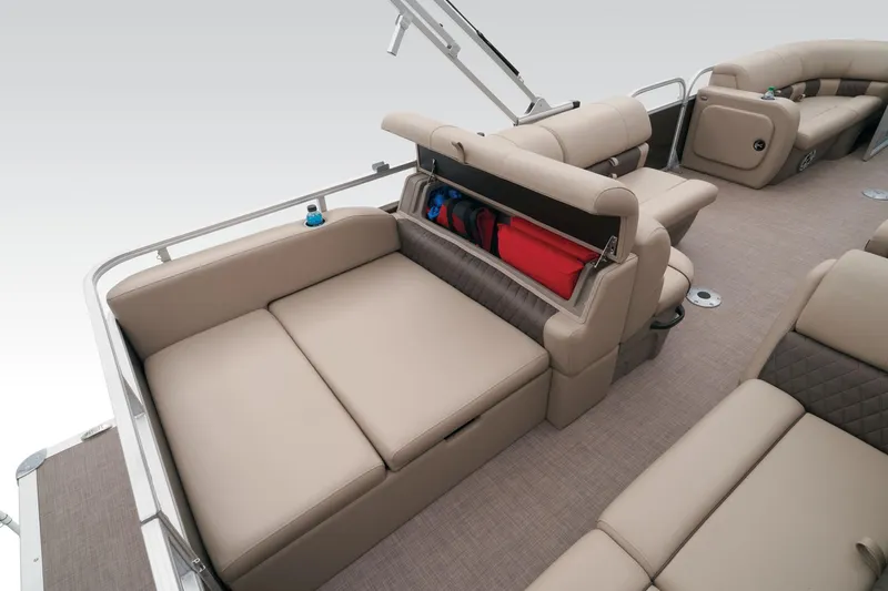 Slide: The Image of 2023 Sun Tracker Party Barge 22 RF DLX interior with storage compartment open. - 25