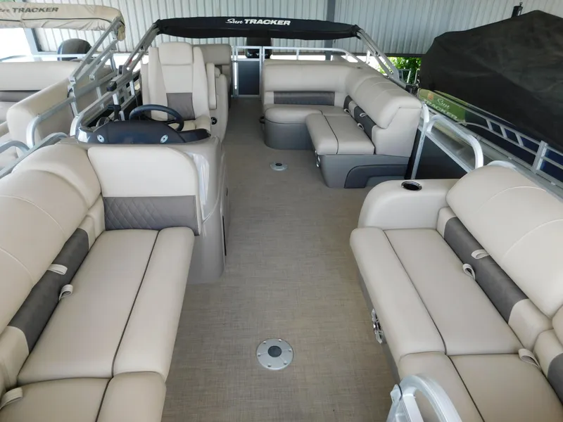 Slide: The Image of 2023 Sun Tracker Party Barge 22 RF DLX interior with spacious seating and modern design. - 8