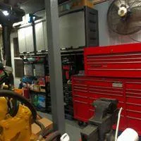 Slide: The Image of Workshop with red tool cabinets and industrial equipment, related to 1936 Dravo Sternwheeler. - 31