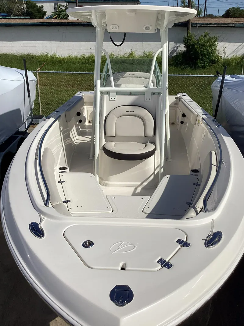 Slide: The Image of 2022 Sailfish 220 CC boat, white interior, center console, spacious seating. - 13