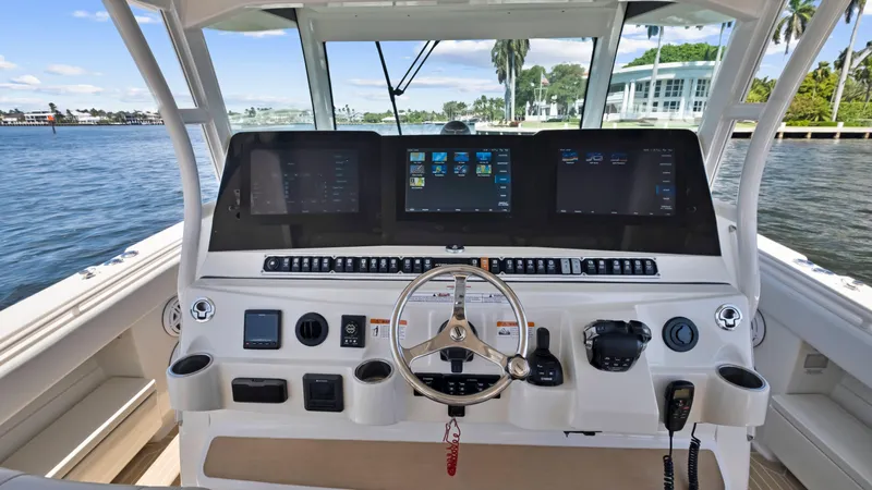 Slide: The Image of Helm of 2018 HCB 53 Sueños boat with advanced navigation systems. - 12