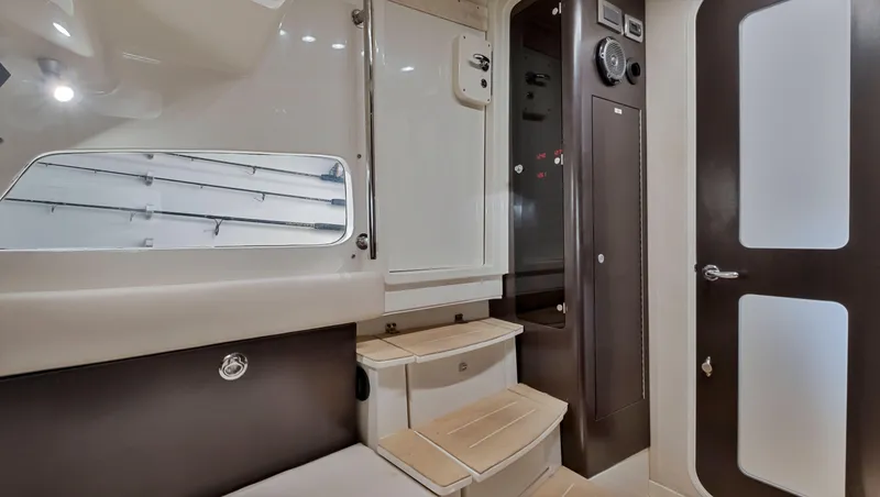 Slide: The Image of Interior cabin of 2018 HCB 53 Sueños boat with modern design and seating. - 27