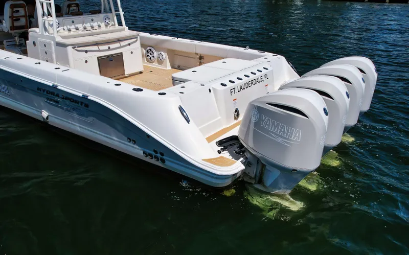 Slide: The Image of 2018 HCB 53 Sueños boat with Yamaha outboard engines in water. - 3