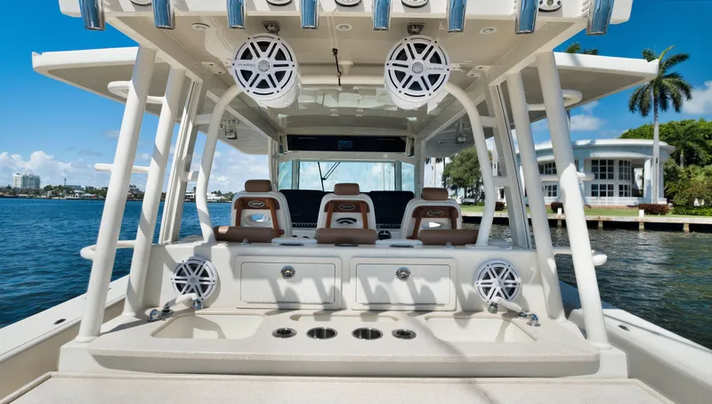 Slide: The Image of 2018 HCB 53 Sueños luxury boat interior with seating and speakers. - 8