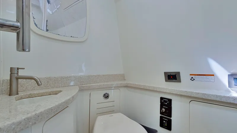 Slide: The Image of Modern bathroom in 2018 HCB 53 Sueños boat with sink and toilet. - 24