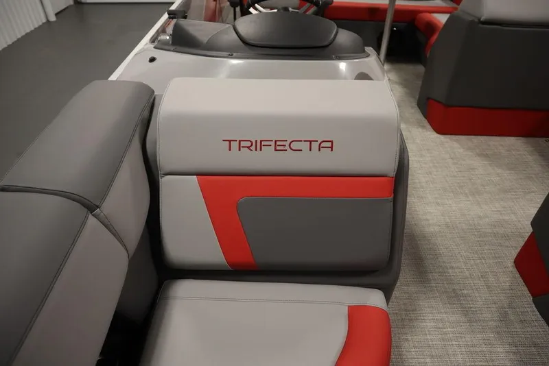 Slide: The Image of 2023 Trifecta 23SB2 SS 3.0 boat interior with gray and red seating. - 11