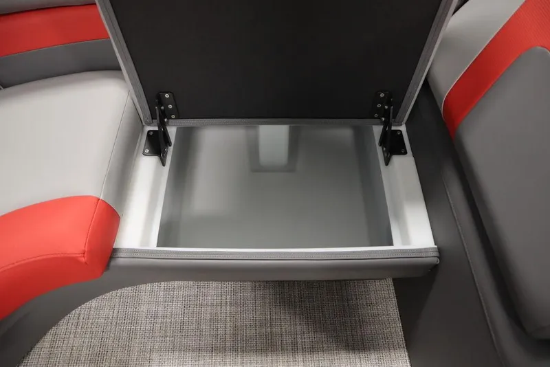 Slide: The Image of 2023 Trifecta 23SB2 SS 3.0 boat storage compartment with red and gray seating. - 13