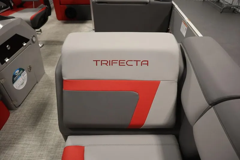 Slide: The Image of 2023 Trifecta 23SB2 SS 3.0 boat interior with red and gray seating. - 18