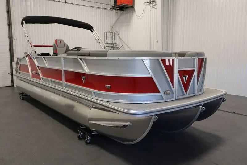 Slide: The Image of 2023 Trifecta 23SB2 SS 3.0 pontoon boat in a showroom. - 2