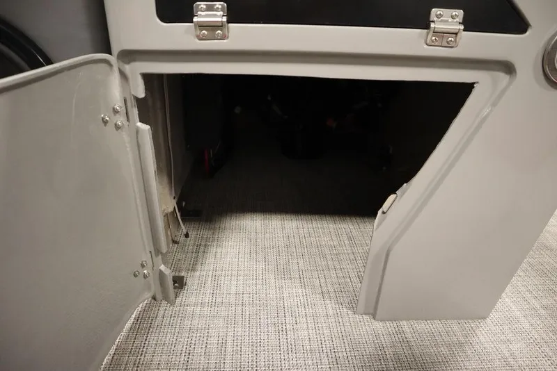 Slide: The Image of 2023 Trifecta 23SB2 SS 3.0 storage compartment with open door. - 20