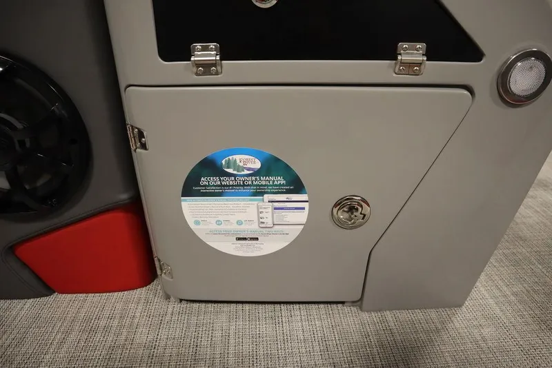 Slide: The Image of 2023 Trifecta 23SB2 SS 3.0 boat storage compartment with instruction label. - 21
