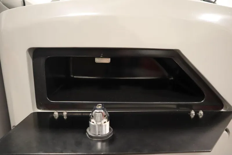 Slide: The Image of 2023 Trifecta 23SB2 SS 3.0 boat storage compartment and accessory. - 22