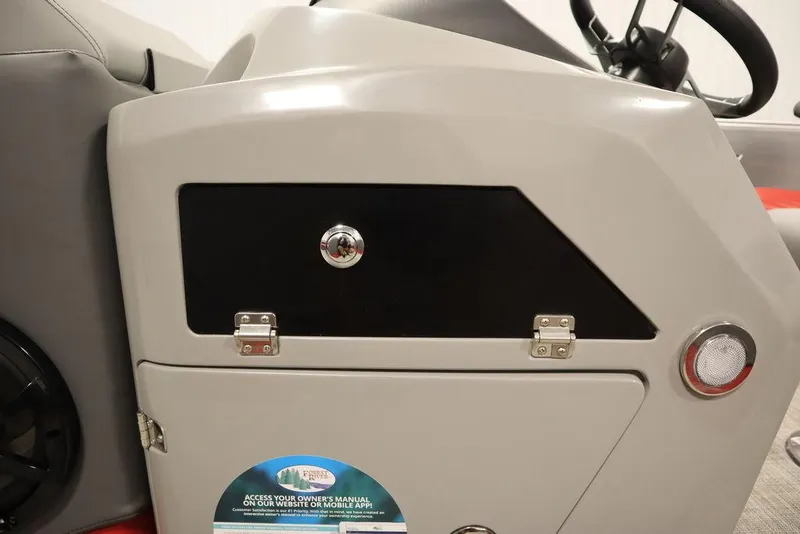 Slide: The Image of 2023 Trifecta 23SB2 SS 3.0 boat dashboard with storage compartment. - 23