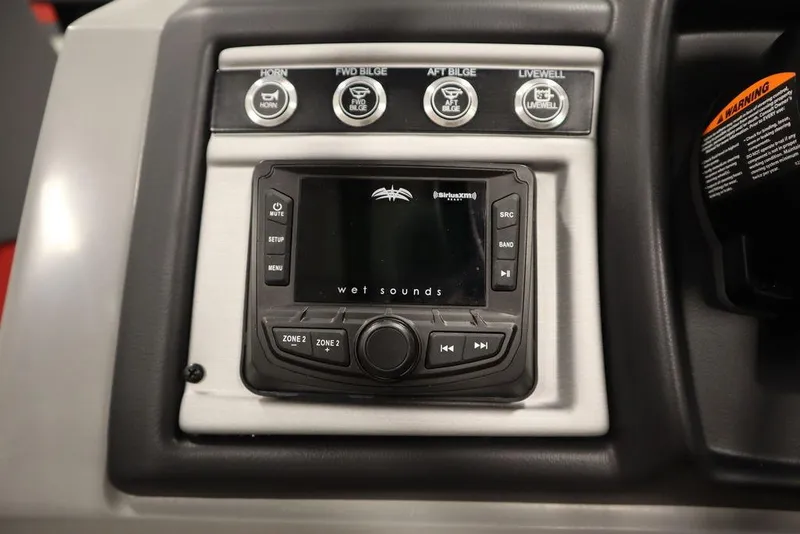 Slide: The Image of 2023 Trifecta 23SB2 SS 3.0 boat control panel with Wet Sounds audio system. - 31