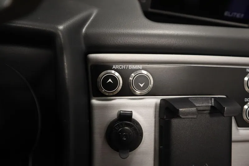 Slide: The Image of Close-up of 2023 Trifecta 23SB2 SS 3.0 control panel with Arch/Bimini buttons. - 32