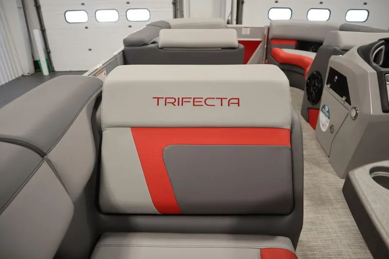 Slide: The Image of 2023 Trifecta 23SB2 SS 3.0 boat interior with red and gray seating. - 33