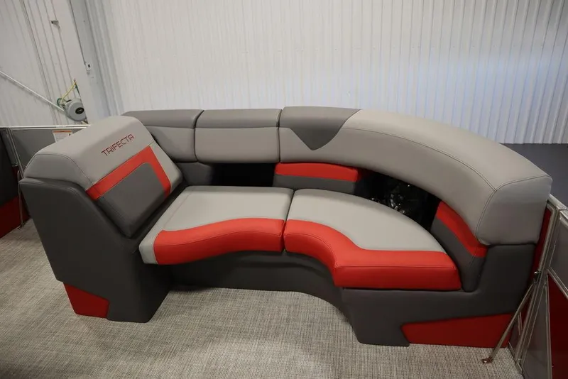 Slide: The Image of 2023 Trifecta 23SB2 SS 3.0 boat interior with red and gray seating. - 38