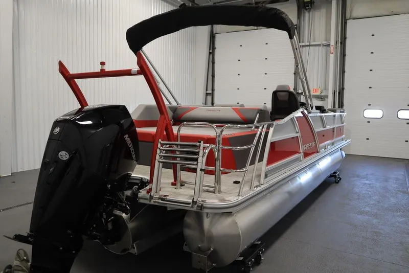 Slide: The Image of 2023 Trifecta 23SB2 SS 3.0 pontoon boat in a showroom. - 4