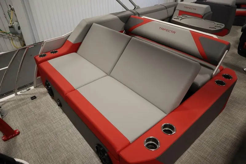 Slide: The Image of 2023 Trifecta 23SB2 SS 3.0 boat interior with red and gray seating. - 41