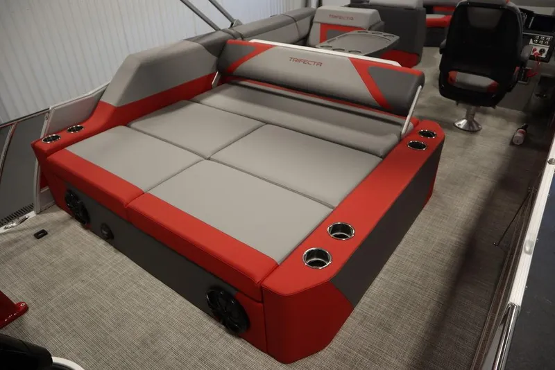 Slide: The Image of 2023 Trifecta 23SB2 SS 3.0 pontoon boat with red and gray seating. - 42