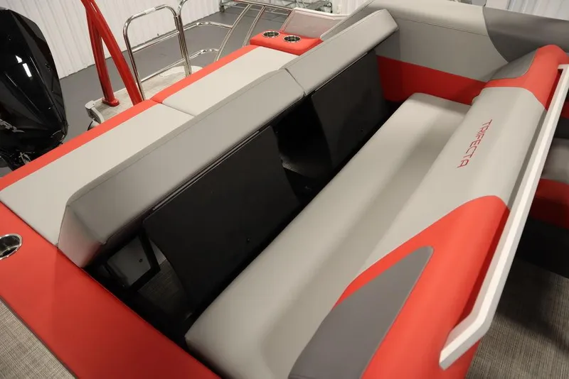Slide: The Image of 2023 Trifecta 23SB2 SS 3.0 boat interior with red and gray seating. - 43