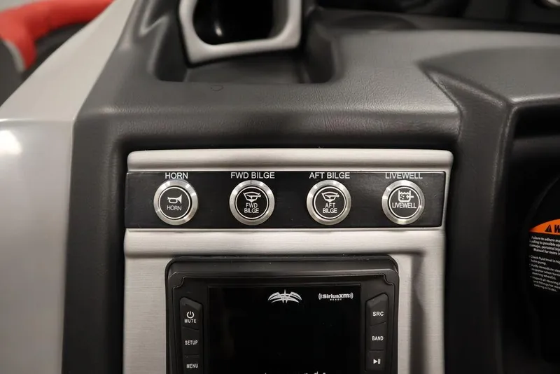 Slide: The Image of 2023 Trifecta 23SB2 SS 3.0 boat control panel with horn, bilge, and livewell buttons. - 45