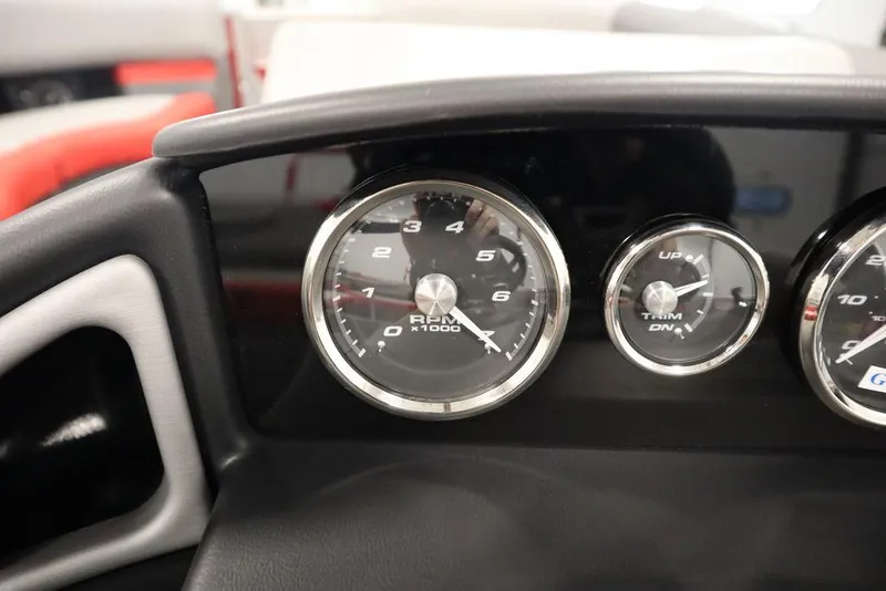 Slide: The Image of Close-up of 2023 Trifecta 23SB2 SS 3.0 boat dashboard gauges. - 46