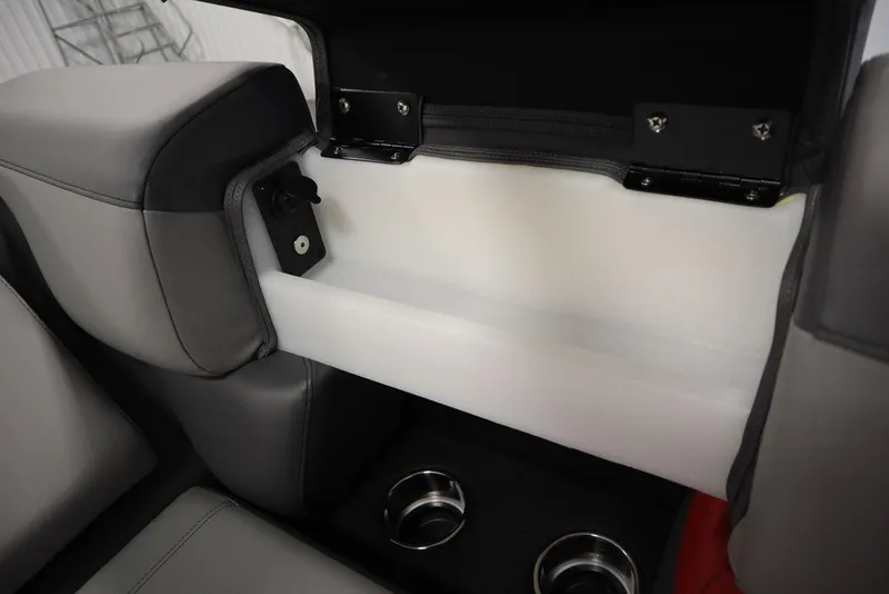 Slide: The Image of 2023 Trifecta 23SB2 SS 3.0 boat interior storage compartment with cup holders. - 47