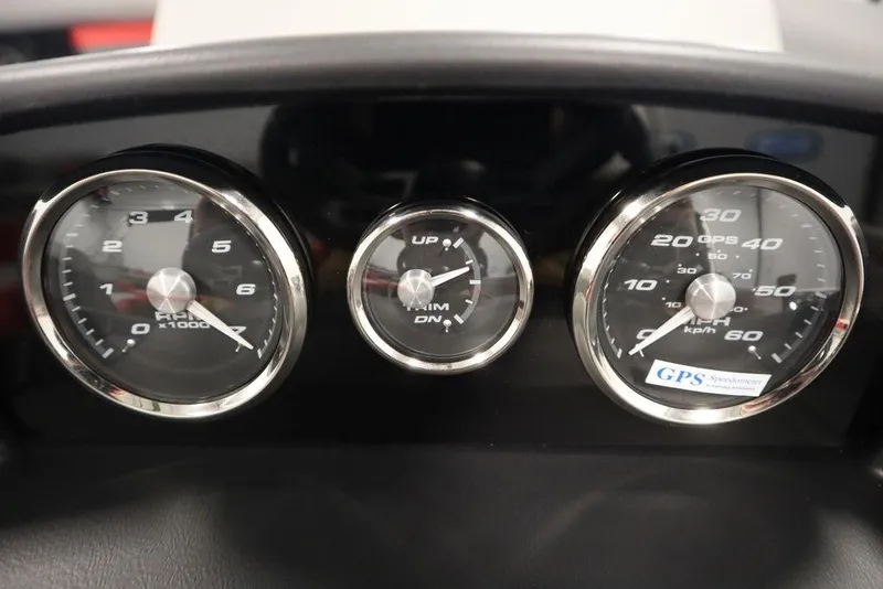Slide: The Image of 2023 Trifecta 23SB2 SS 3.0 dashboard gauges with speedometer, tachometer, and trim indicator. - 48