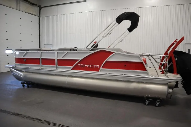Slide: The Image of 2023 Trifecta 23SB2 SS 3.0 pontoon boat in a showroom. - 7