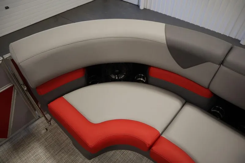 Slide: The Image of 2023 Trifecta 23SB2 SS 3.0 boat interior with red and gray seating. - 8