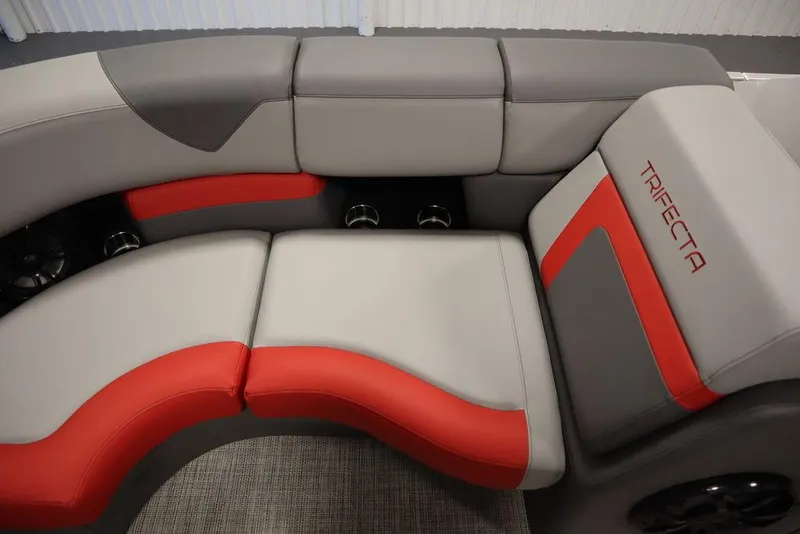 Slide: The Image of 2023 Trifecta 23SB2 SS 3.0 boat interior with gray and red seating. - 9