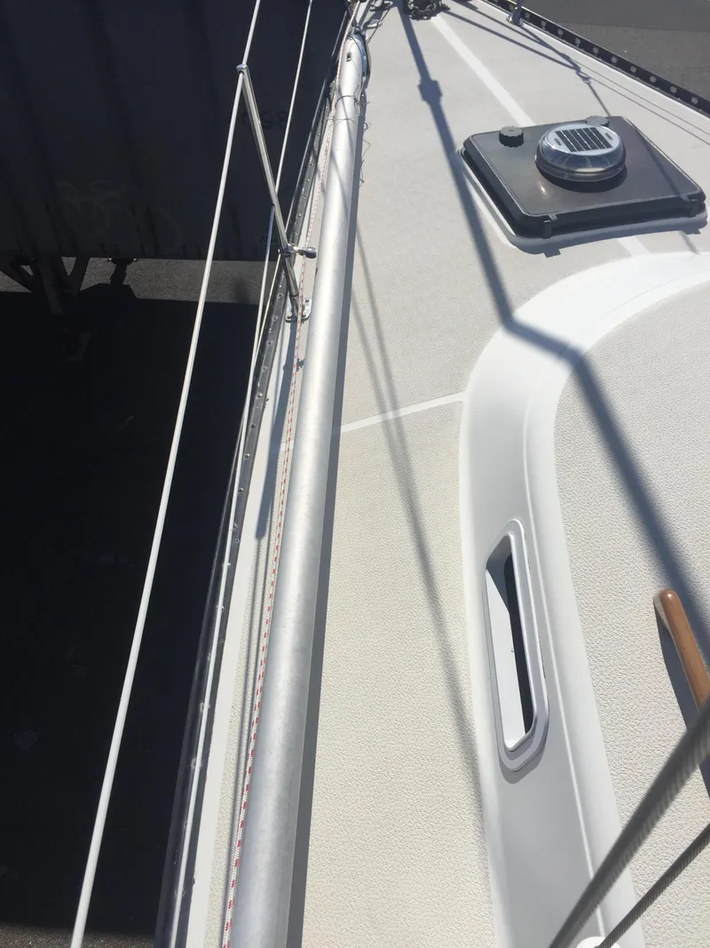 Slide: The Image of 1980 Tartan 33 sailboat deck with rigging and hatch. - 2