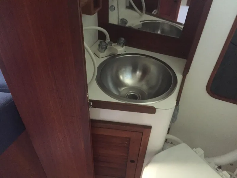 Slide: The Image of 1980 Tartan 33 sailboat bathroom sink and cabinet - 22