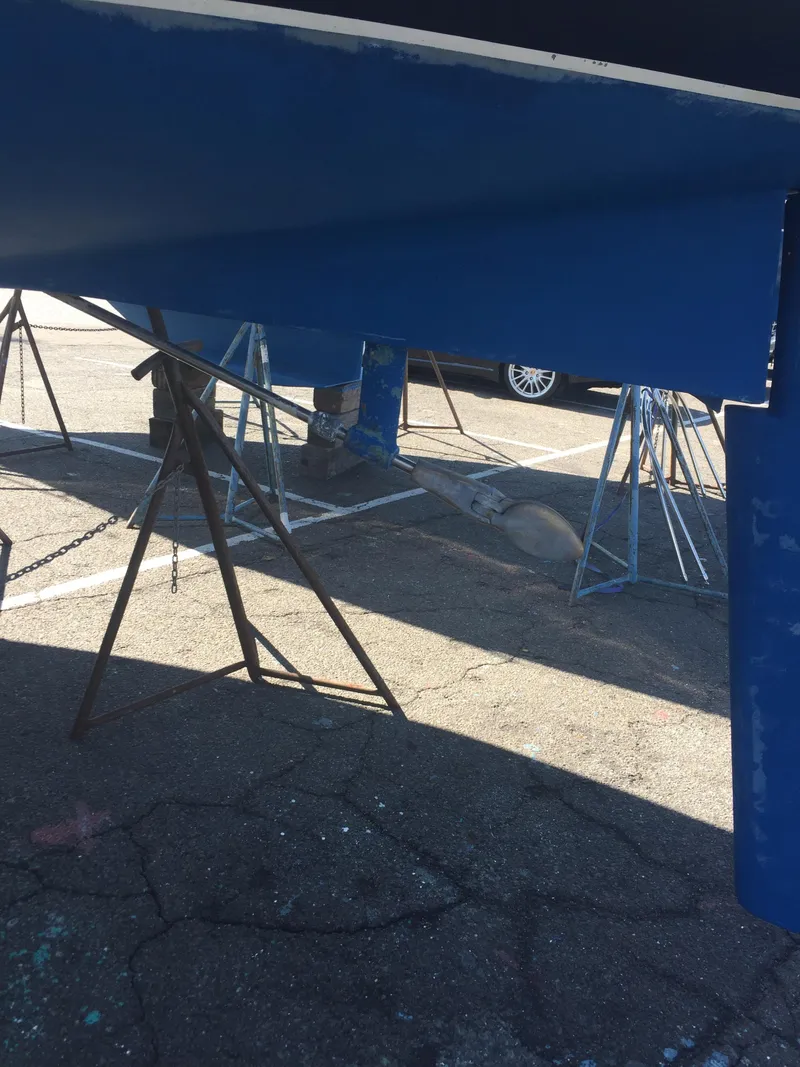 Slide: The Image of 1980 Tartan 33 sailboat hull on stands for maintenance. - 25