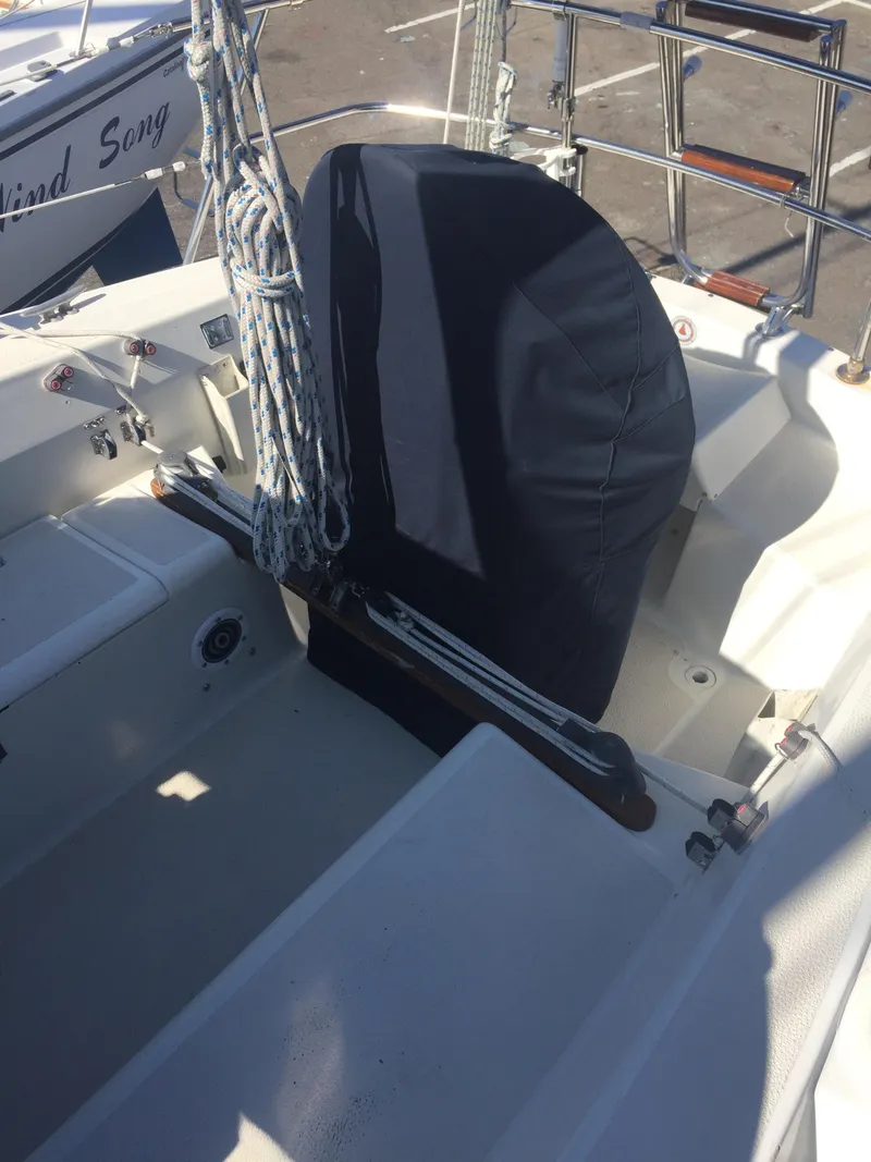 Slide: The Image of Cockpit of a 1980 Tartan 33 sailboat with covered steering wheel. - 9
