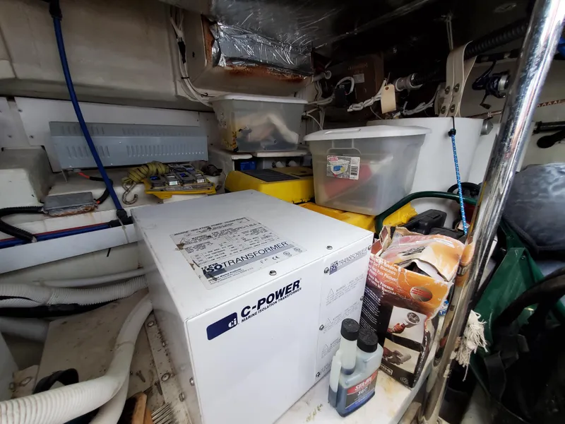 Slide: The Image of Engine room of a 2003 Carver 570 Voyager Pilothouse with C-Power equipment. - 22