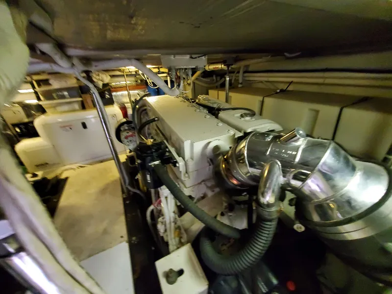 Slide: The Image of Engine room of a 2003 Carver 570 Voyager Pilothouse yacht. - 27